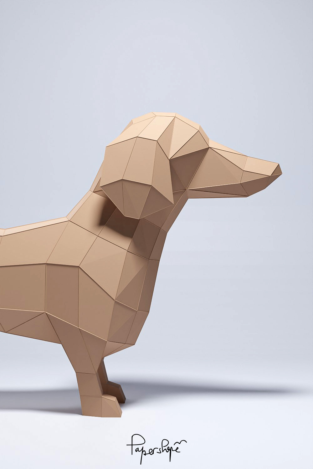 Papercraft dachshund "Franz" in profile from the right against a light blue background, with visible edges and clear fold structure
