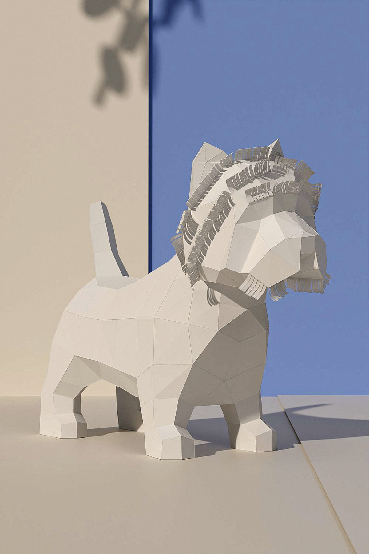 Low poly papercraft Westie made of linen-coloured cardstock, seen at an angle from the front with its tail up and cut fringes on its head, against a beige and blue wall with plant shadows.
